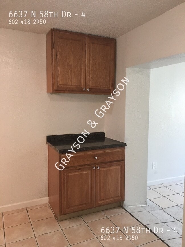 Foto del edificio - 6637 N 58th Dr