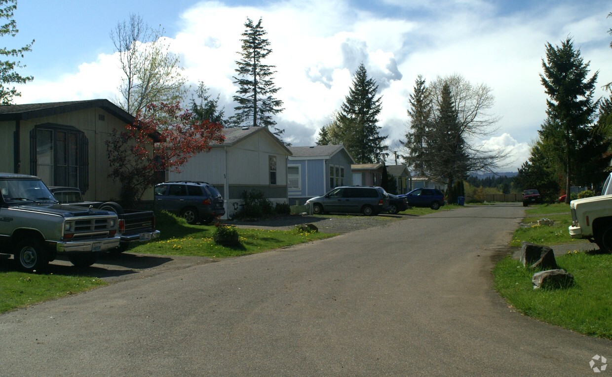 Building Photo - Wooded Village