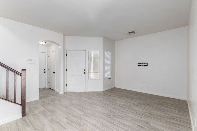 Building Photo - Very nice inside! Gorgeous flooring!