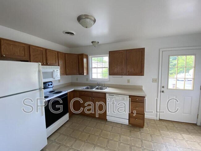 Building Photo - 8065 White Church Rd