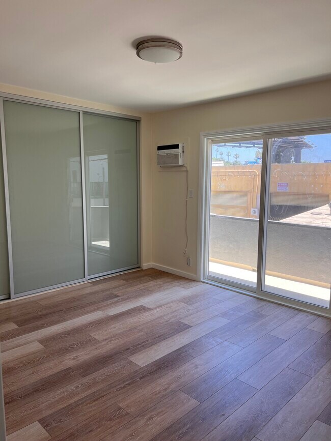 Main bedroom with patio - 648 N Hayworth Ave