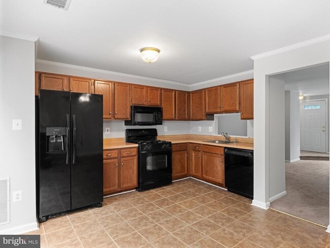 Building Photo - 7466 Towchester Ct