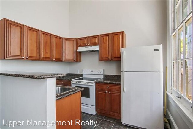 Building Photo - 1 br, 1 bath Apartment - 1217 - 1219 Magaz...