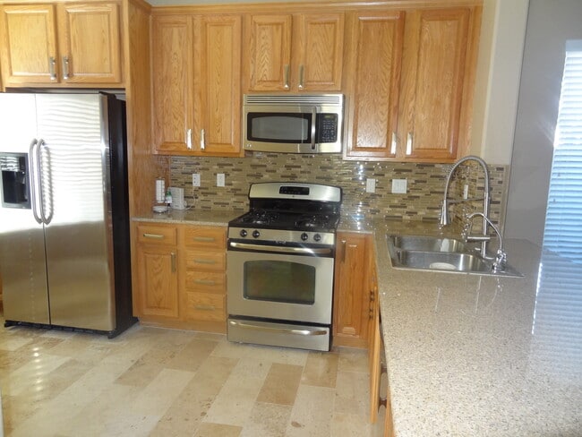 Building Photo - 3 Bedroom, 2 1/2 Bath Home With Attached Garage In A Gated Community