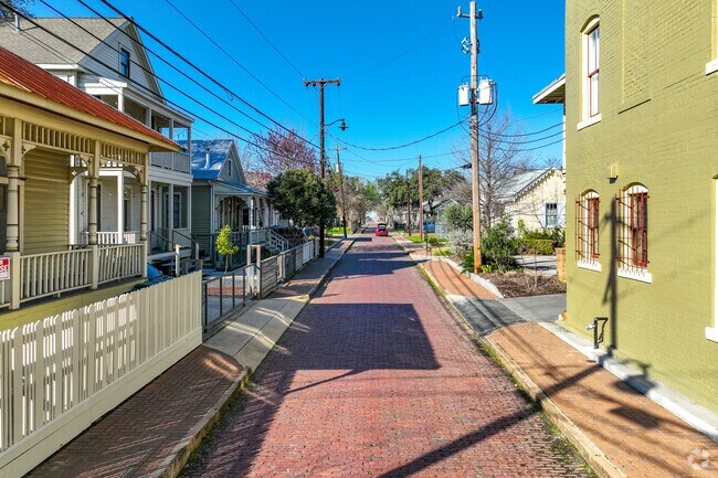 Townhomes and bungalows line the historic brick streets like Silver Street.