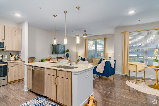 1 habitación, 1 baño - 865 pies cuadrados - Cocina - Overture Cotswold 55+ Active Adult Apartment Homes