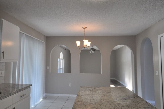 Building Photo - Rare find! Sutton Lakes 5 bedroom on seren...