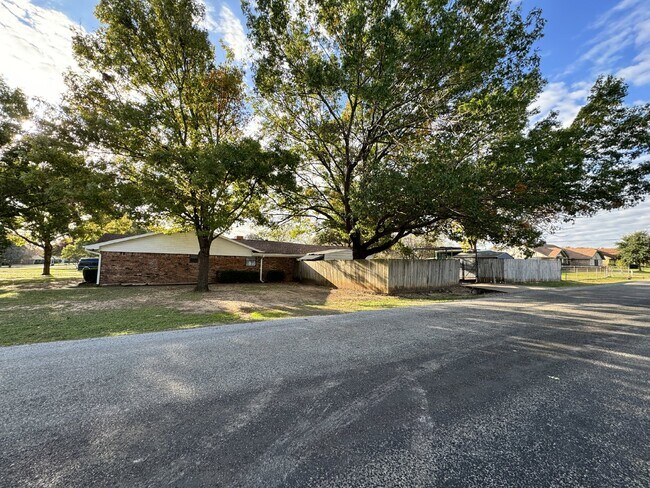 Building Photo - For Rent: 3 bedroom 2 bath with a pool and...