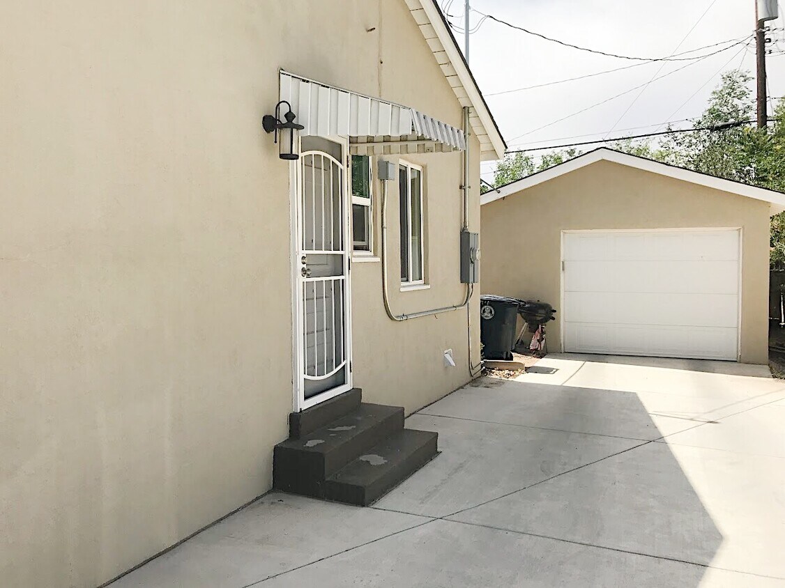 Single car detached oversized garage with opener. Side door into laundry rm/kitchen; updated electrical. - 3416 Mackland Ave NE