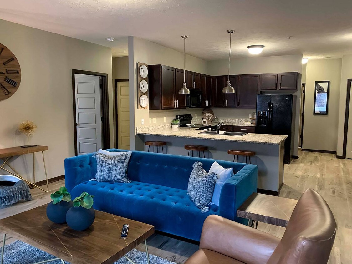 Our spacious layouts create a welcoming atmosphere for gathering with friends or unwinding after a long day. - North Pointe Villas