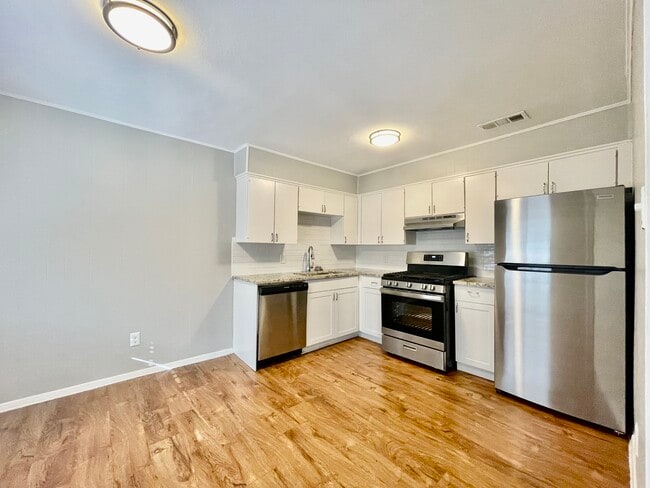 Unit 24 Kitchen and Dining Area - Sundance Apartments