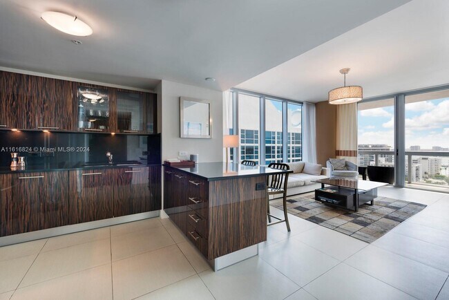 Building Photo - 6899 Collins Ave