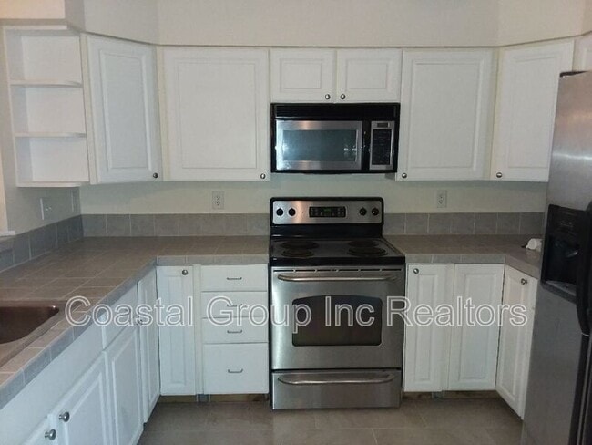 Building Photo - 8550 Tidewater Dr