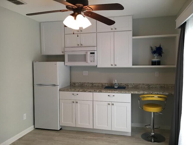 Kitchenette, electric appliances, dishes & silverware - 7782 Pikes Peak Dr