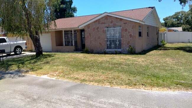 Building Photo - Located in the Heart of Town 'N Country!