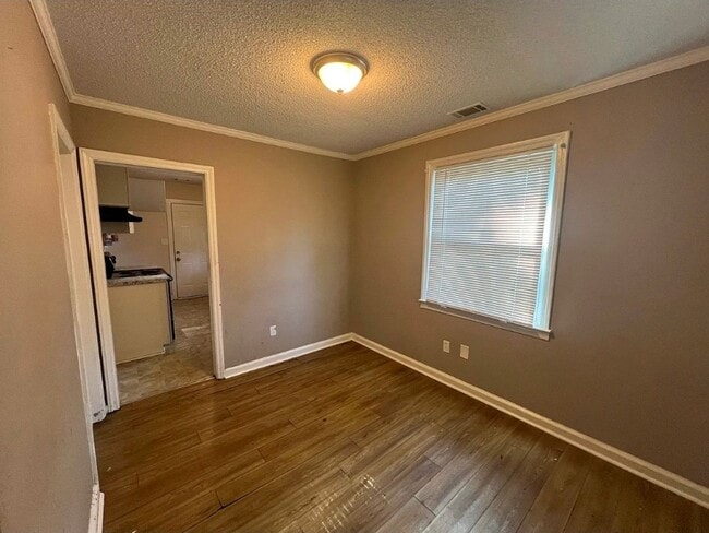 Building Photo - Charming Home with Front & Rear Porches overlooking large yard!!