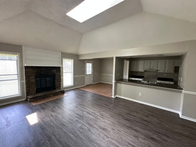 Photo - Charming 3BR/2BA Near Southwind | Soaring Vaulted Ceilings, Rustic Fireplace & Garage House