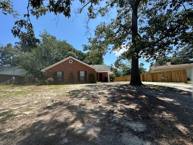 Building Photo - 3/2 No carpet & Fenced yard off Old Waynes...
