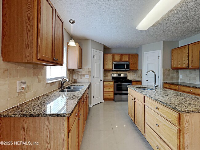 Foto del edificio - 5596 Ashleigh Park Dr