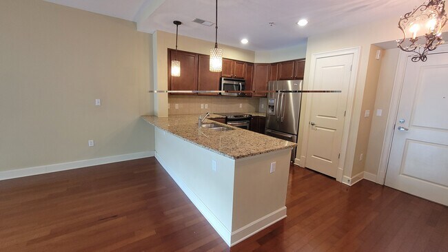 kitchen area with pantry - 200 River Vista Dr