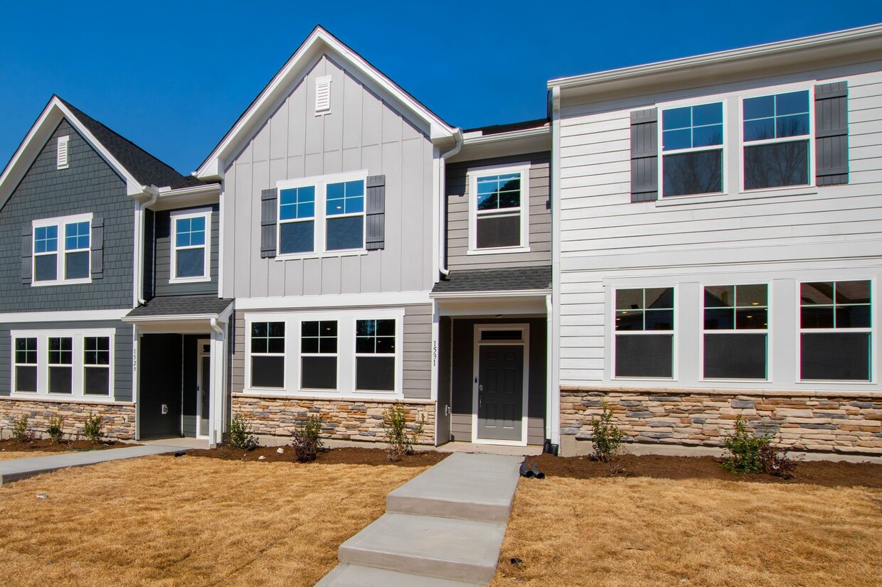 Primary Photo - Modern Comfort & Convenience: 2-Story Town...
