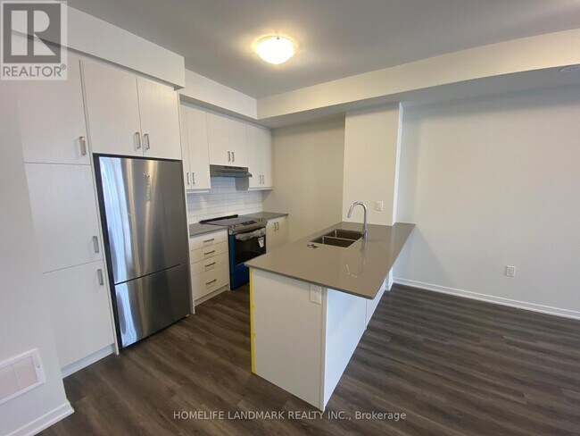 Photo du bâtiment - 131 Honeycrisp Cres