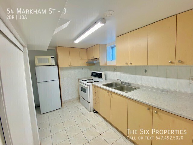 Photo du bâtiment - Bright 2 Bedroom Apartment