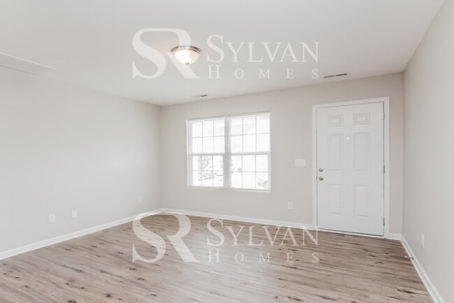 Building Photo - Turn the key. Enter. Smile. Repeat every day!