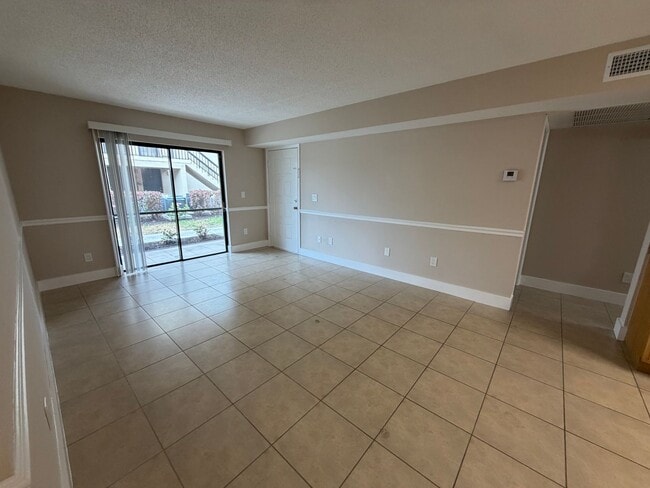 Building Photo - ANNUAL RENTAL - 2 BED / 2 BATH CONDO AT MYSTIC GARDENS