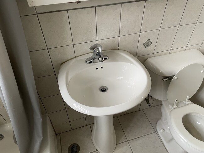 Bathroom with pedestal sink - 17828 Park Ave