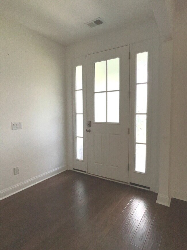 Building Photo - "Spacious 4-Bed Oasis with Stunning Lake V...