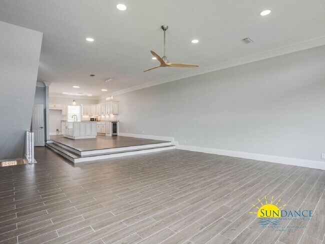 Building Photo - Updated Waterfront Townhome with Incredible Features and Boat & Jet Ski Lifts!