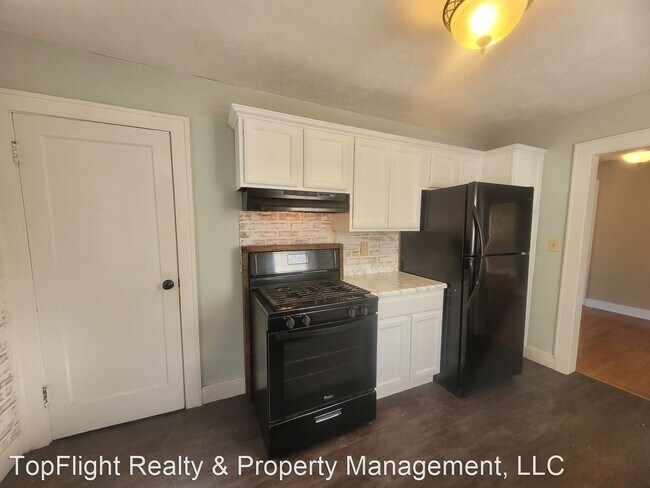 Building Photo - 4 br, 2 bath House - 411 W. 15th Street