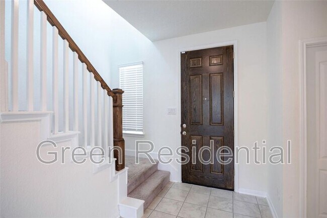 Foto del edificio - 702 Hardwood Grv Ct