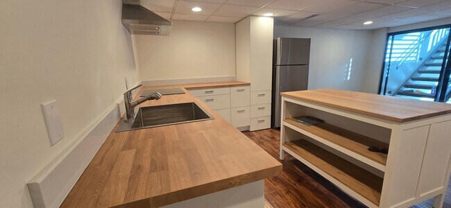 Building Photo - Remodeled 2-Bedroom Basement Home with Pri...