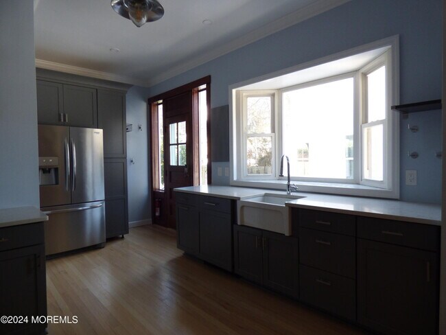 Building Photo - 61 8th Ave
