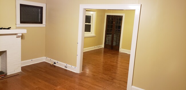 Living room into dining room - 1496 W Clifton Blvd