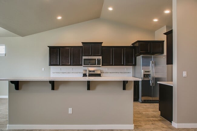 Building Photo - Very Close to Micron  5 Bedroom 3 Full Baths - includes dual Master Suites  -  Boise Available soon!