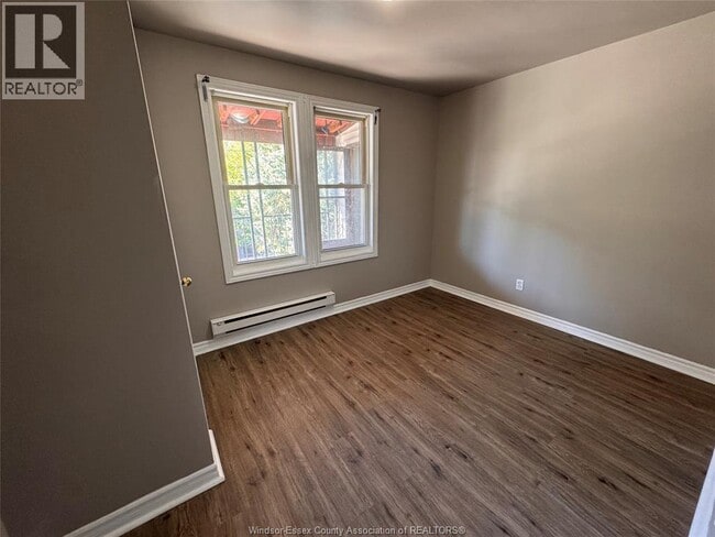 Building Photo - 1597 Drouillard Rd