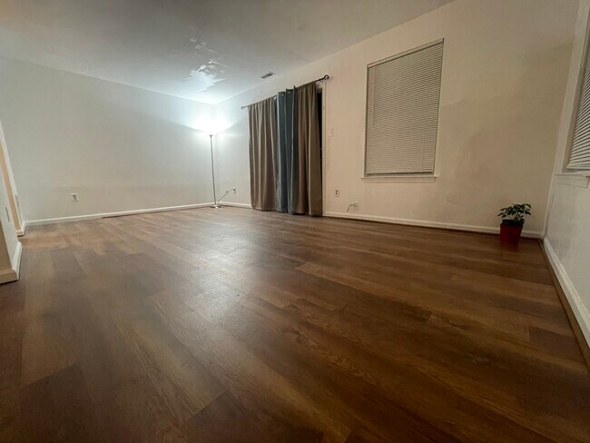 Living room with new luxury vinyl flooring - 3901 Tall