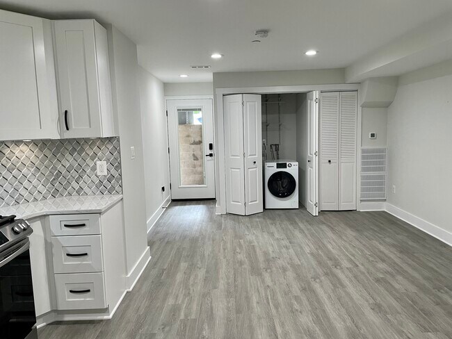 Main room with laundry closet - 731 Girard St NW