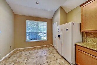 Building Photo - 8723 Rollick Dr