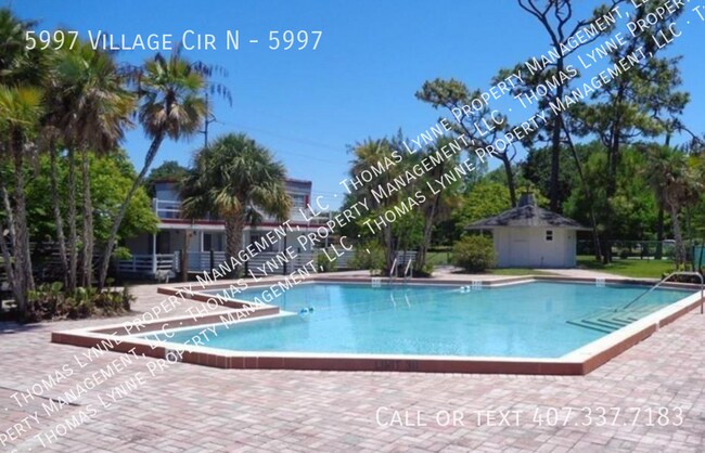 Building Photo - 5997 Village Cir N