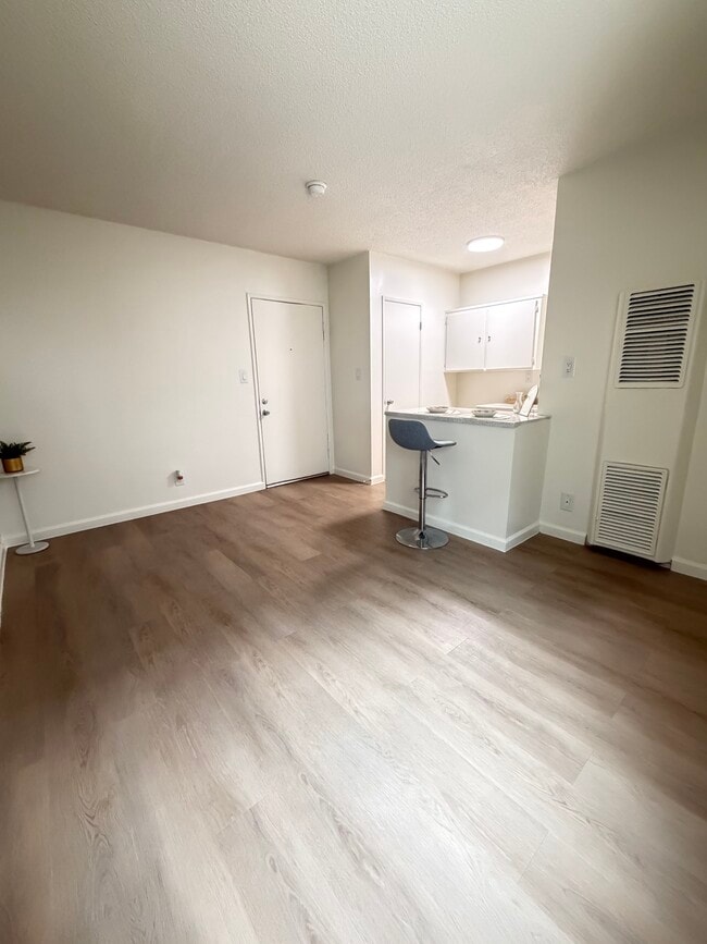 Área de estar para solteros - Studio Village Apartments