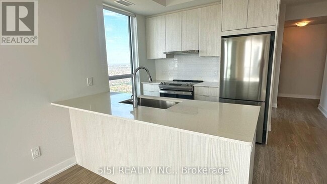 Photo du bâtiment - 430-4430 Square One Dr