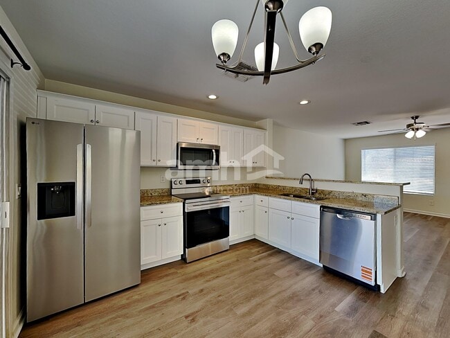 Building Photo - 15374 W Gelding Dr