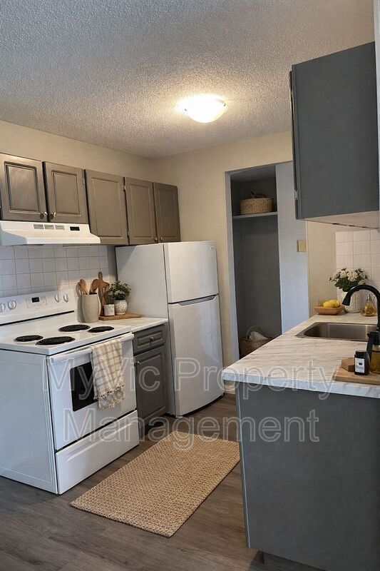 Photo du bâtiment - 9108-9149 149 St