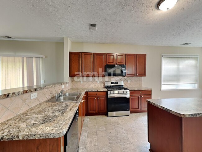 Foto del edificio - 7105 Flagstone Pl