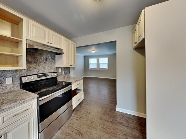 Building Photo - 7745 Madrid Ave