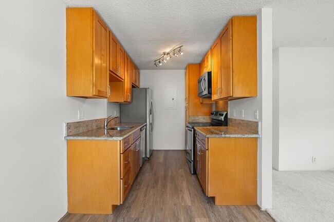Building Photo - Charming 2-Bedroom Townhouse at Haiku Poin...